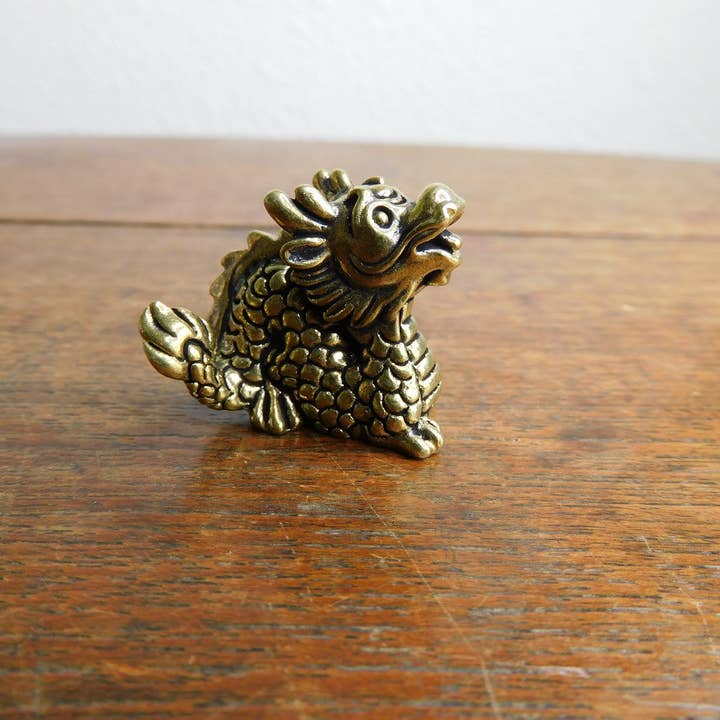 Small Brass Baby Dragon Figurine for wholesale by Superior Stones & Gifts INTL LLP