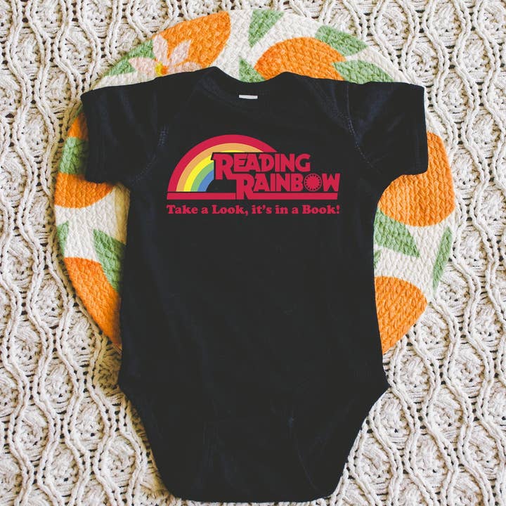 Reading Rainbow Baby Onesie | Retro 80s for wholesale by Keen Bee Studio