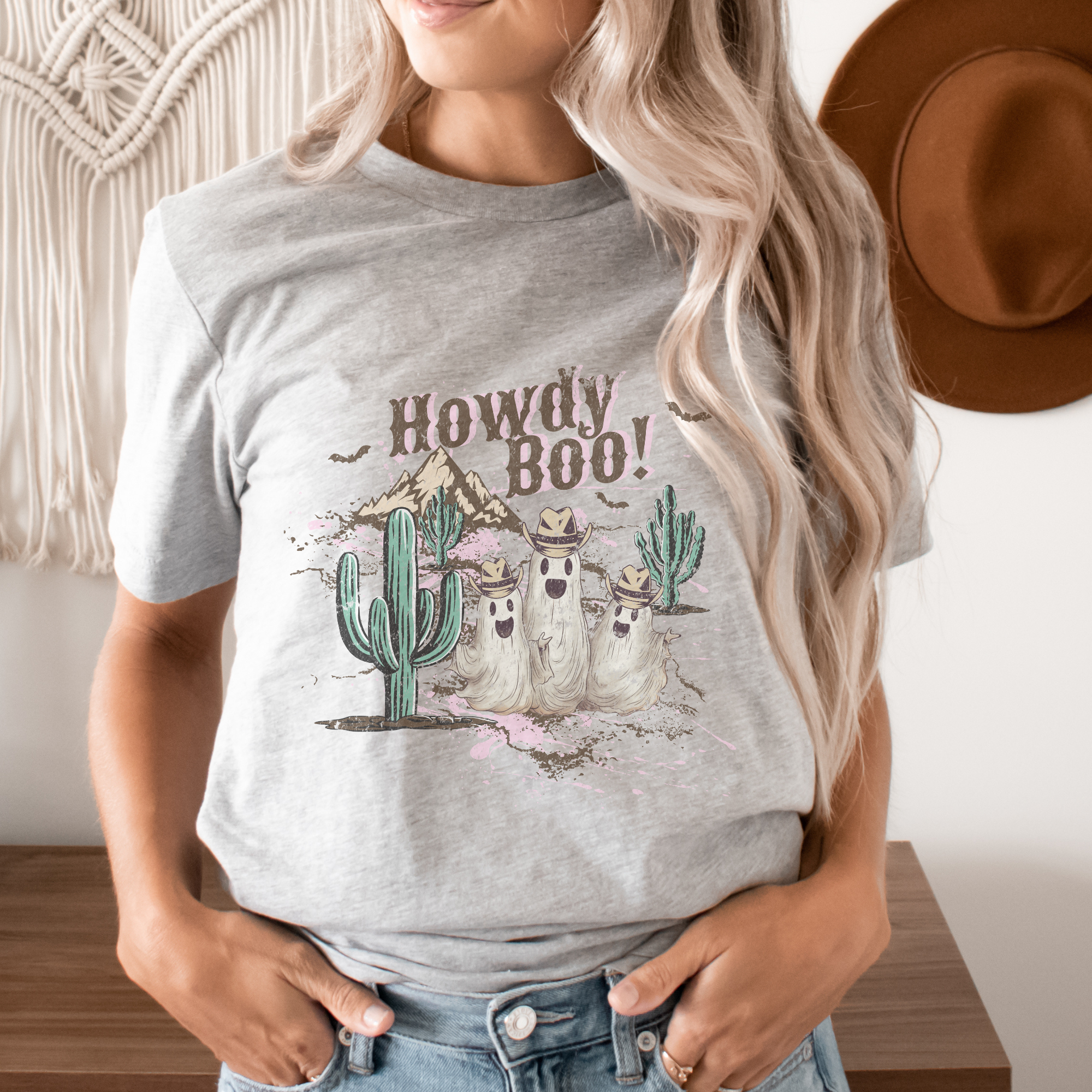 Trendznmore - Modern Graphic Apparel – wholesale Screen printed t-shirt – Women′s – Howdy Boo Western Halloween Graphic T-Shirt 1
