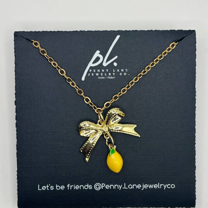 Penny Lane Jewelry Co - Wholesale Pendant/Charm Necklace - Daphne Gold Lemon Bow charm necklace 0