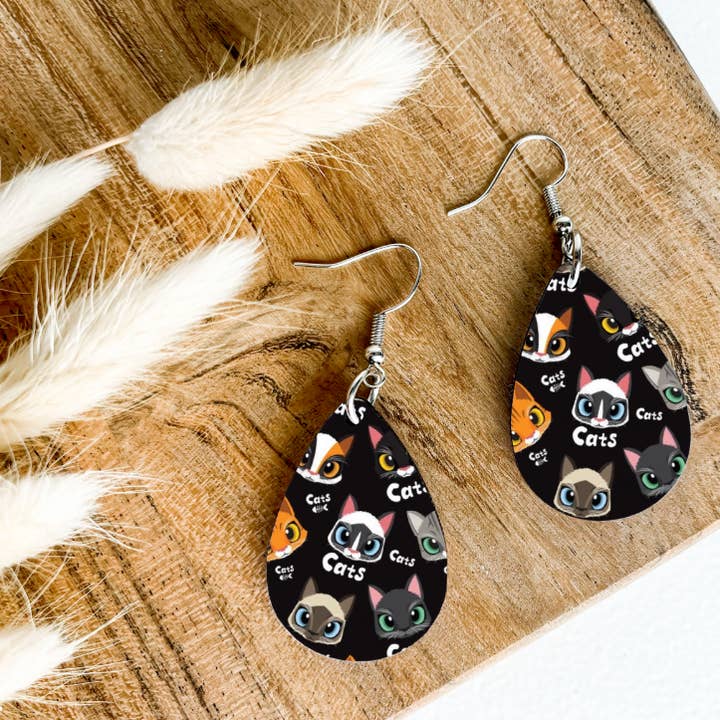 CAT FACES on black print dangle teardrop earrings for wholesale by Eartherella Soap & Candle Co., LLC