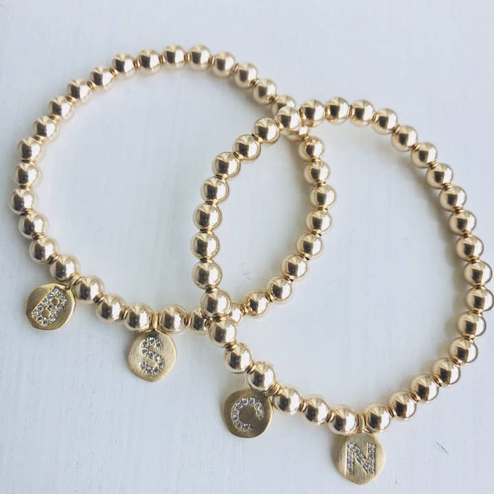 5mm 14k gult guld fyllda pärla armband w/matchande initiala för wholesale av Kelly and Rose Boutique
