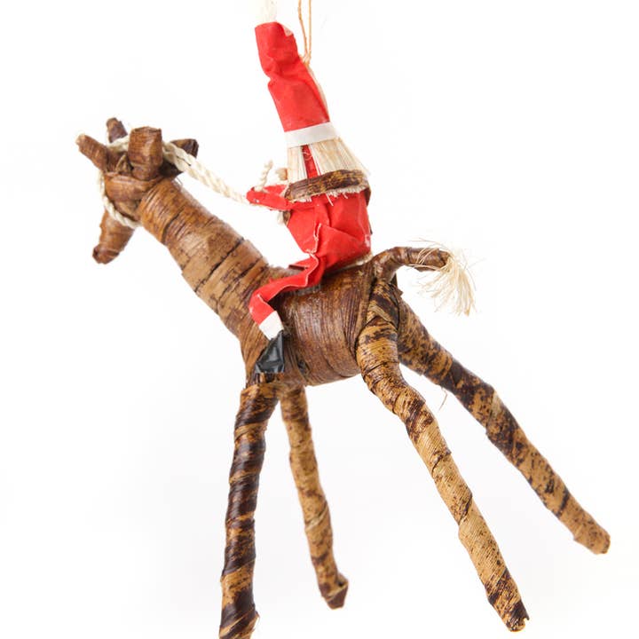 Swahili | AFRICAN MODERN - Wholesale Ornament - Banana Fiber Santa on Giraffe