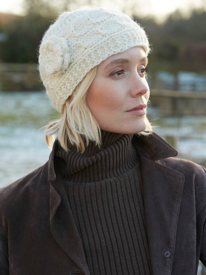 Chamonix - Cream Cable Knit Crocheted Flower Beanie Hat for wholesale by Pachamama Ltd
