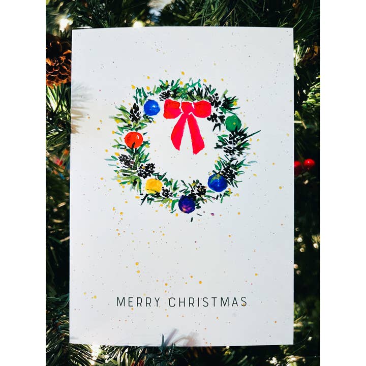 Tarjeta Navideña Amigable con la Comunidad Queer: Corona Arcoíris de Feliz Navidad para venta al por mayor de Gemma Moon