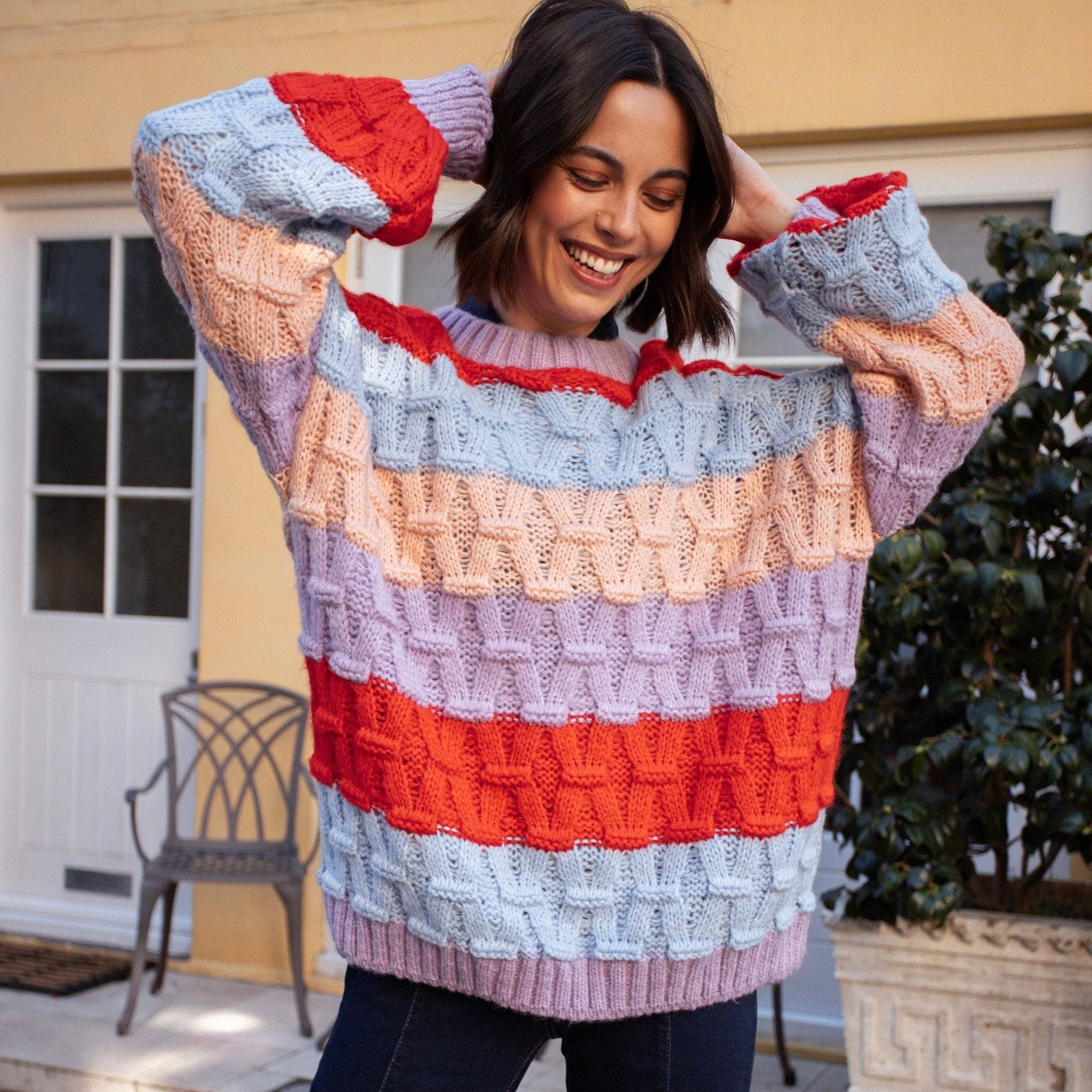 Cara & The Sky – wholesale Knitted jumper – Women′s – Mandy Criss-Cross Stitch Balloon Sleeve Stripe Jumper - Orange21