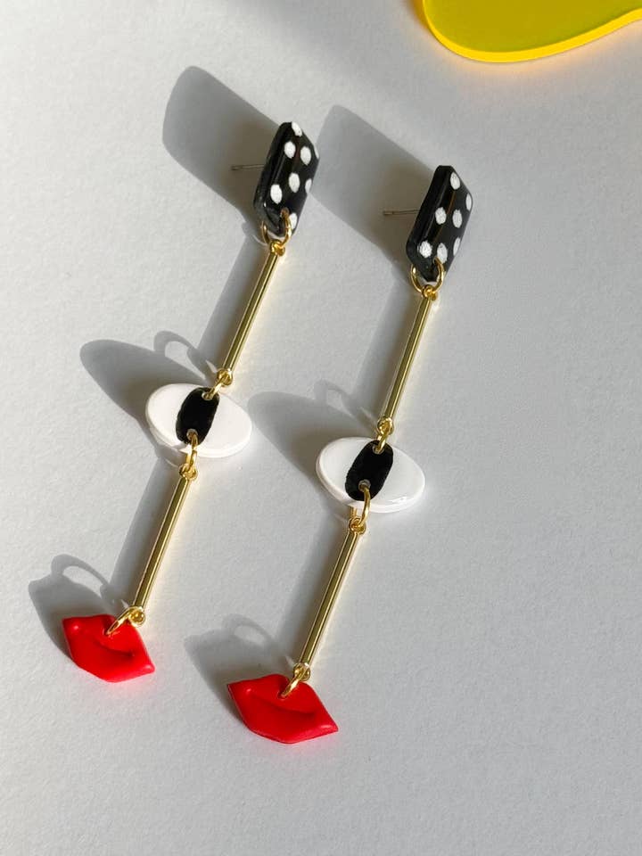 Öga Älskar Ett Rött Läppstift för wholesale av Delaney and Blu