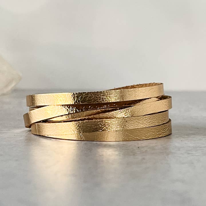 Sloane Sliced Wrap Bracelet In Gold for wholesale by Presh