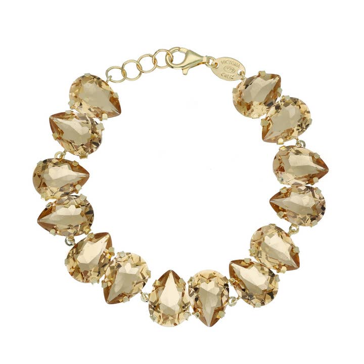 Magnolia bracelet with champagne crystal teardrop in gold-plated silver for wholesale by Victoria Cruz