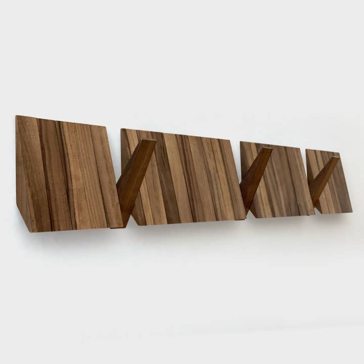 Wall-Mounted Coat Rack with 26 Flip-Down Hooks - Switchboard and other Purchase wholesale coat racks. Free returns & net 60 terms on Faire trending on Faire.