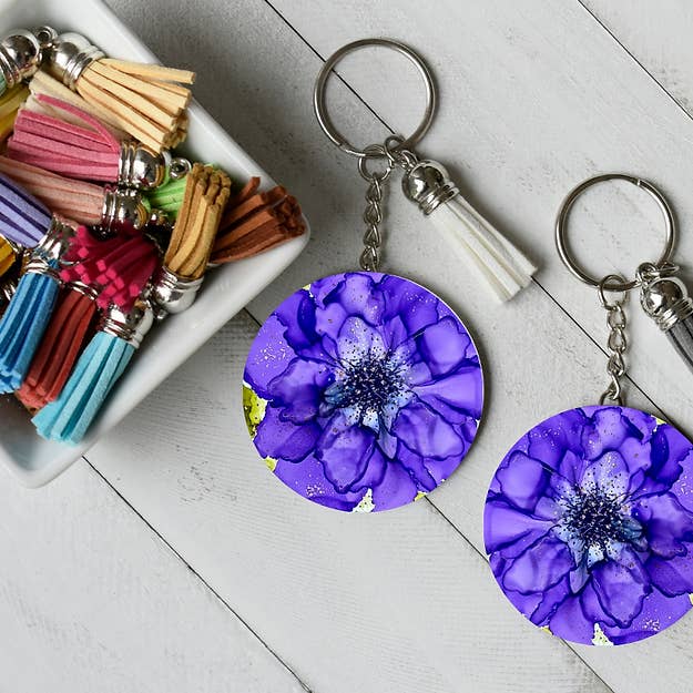 Angie's Double-Sided Wooden Keychain with Tassel for wholesale by Angie Bryant Art