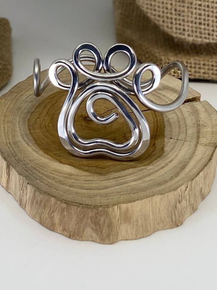 Bracciale a polsino in alluminio ipoallergenico Paw per la vendita all'ingrosso da parte di The Artist Jay