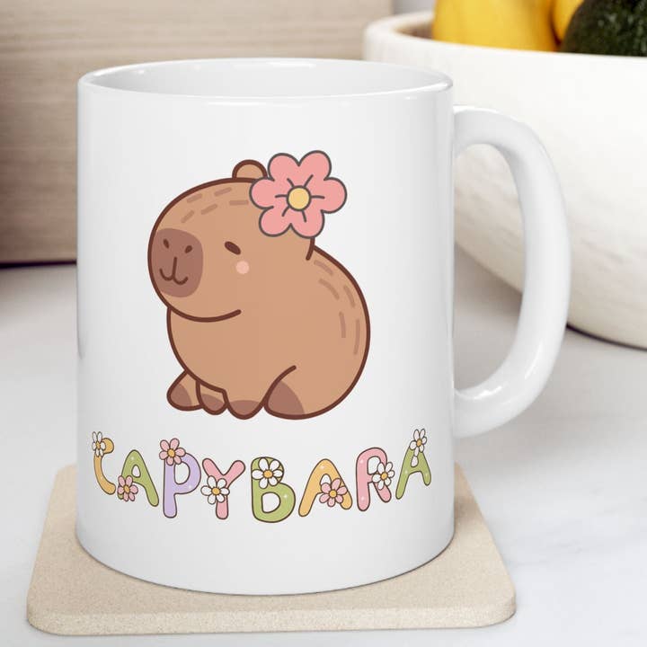 Mug en céramique mignon avec motif floral de capybara pour la vente par Happythings76