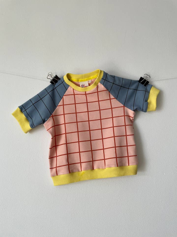 Aggiungi la t-shirt in corallo per la vendita all'ingrosso da parte di Bibi Tchok