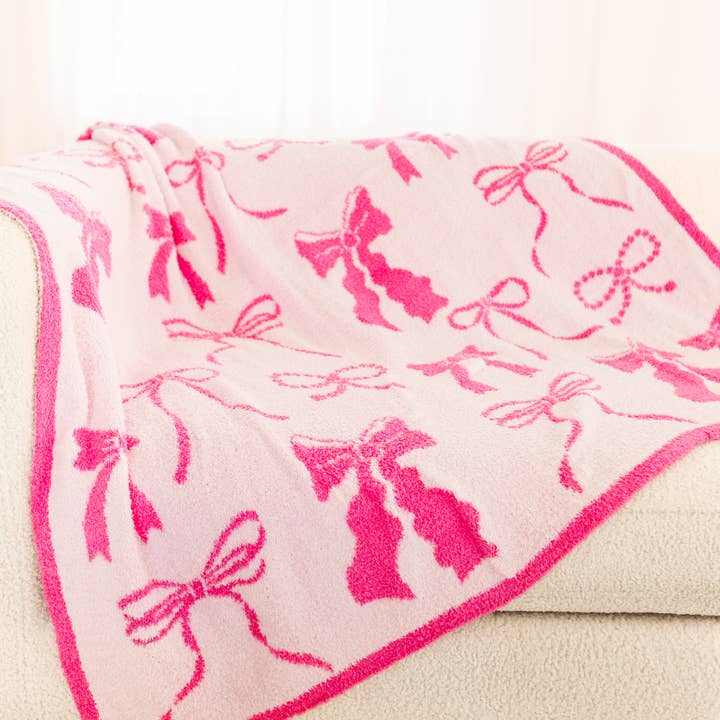 Wrapped in Bows - Plush Cozy Pink Bow Luxury Throw Blanket and other Purchase wholesale couch. Free returns & net 60 terms on Faire trending on Faire.