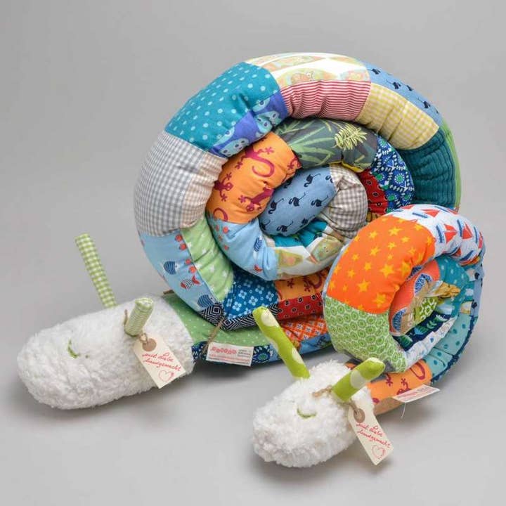 Pucki den svøbende snegl - babynest for engroshandel hos tinéba