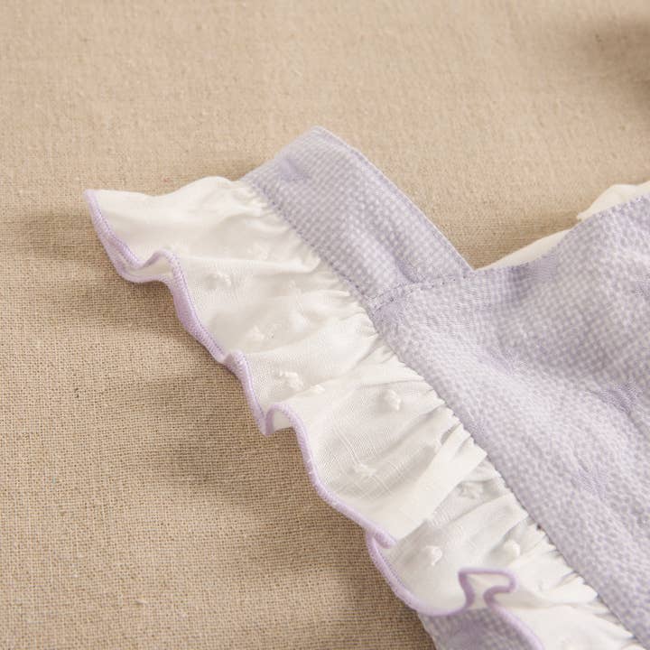 Lila Jumpsuit för flicka med hjärtan och volanger för wholesale på Faire3