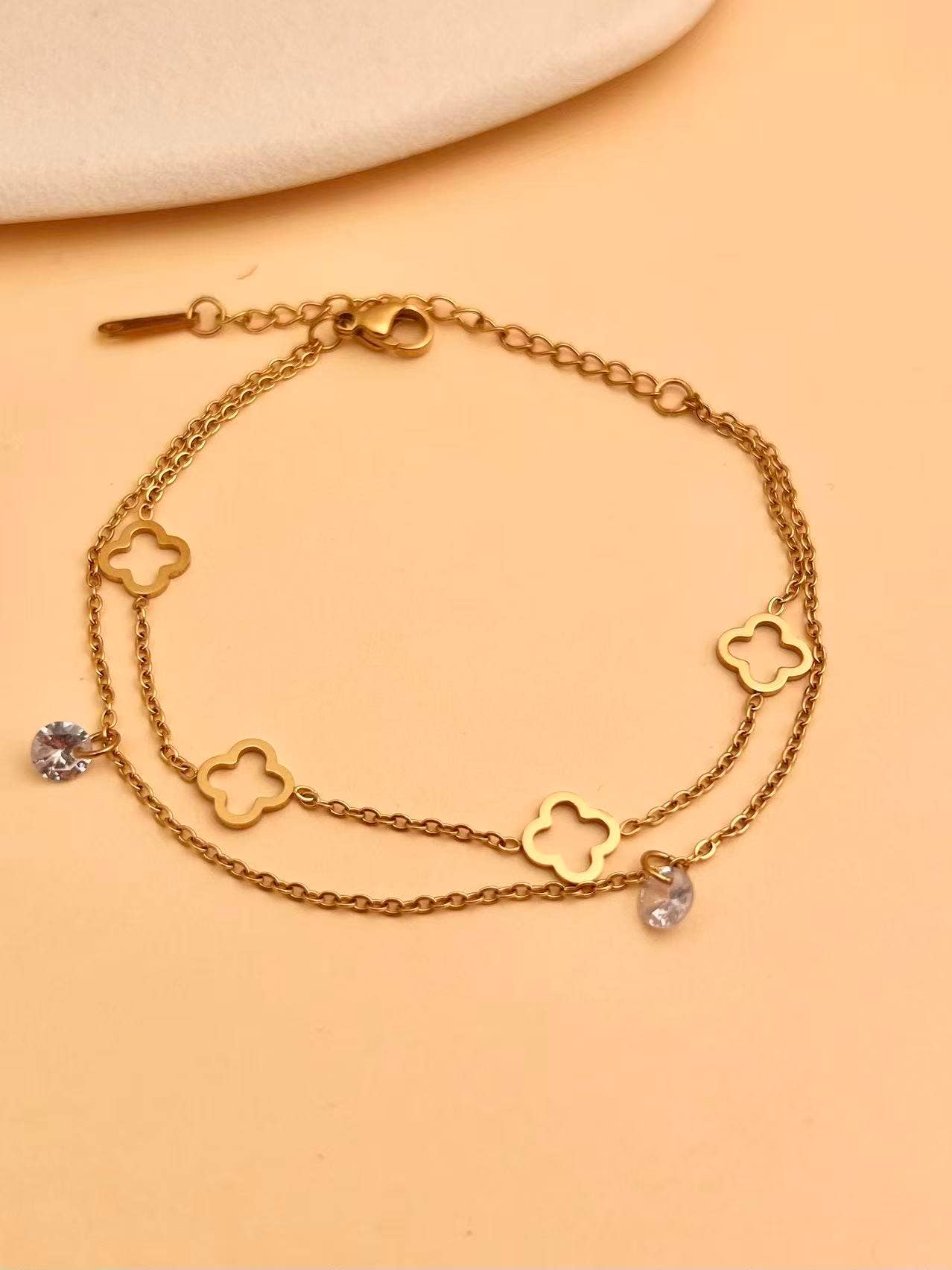 COSMOS - Wholesale Charm/Dangle Bracelet - Double Chain Gold Bracelet with Clovers and Gemstones1