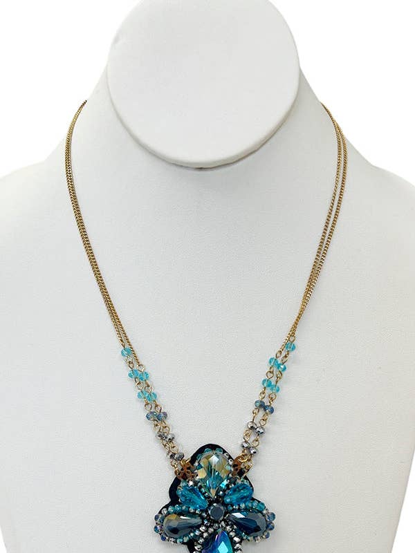 Collier avec pendentif en pierres précieuses florales pour la vente par Andrea Bijoux