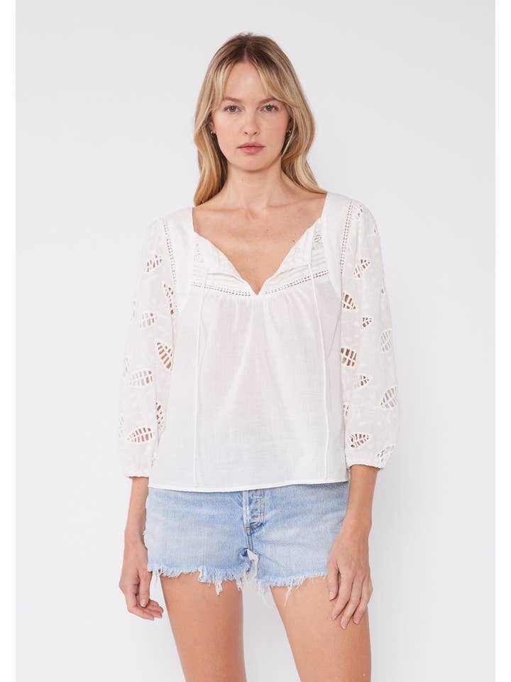 White Embroidered Cutout 3/4 Sleeve Tie Neck Blouse for wholesale on Faire