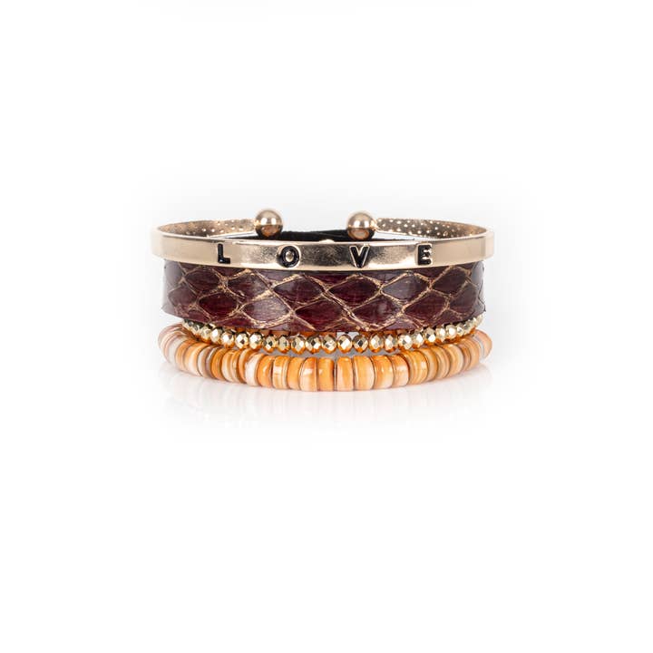 Python Leather Bracelet Stack with Gold “LOVE” Cuff & Orange for wholesale by The Dark