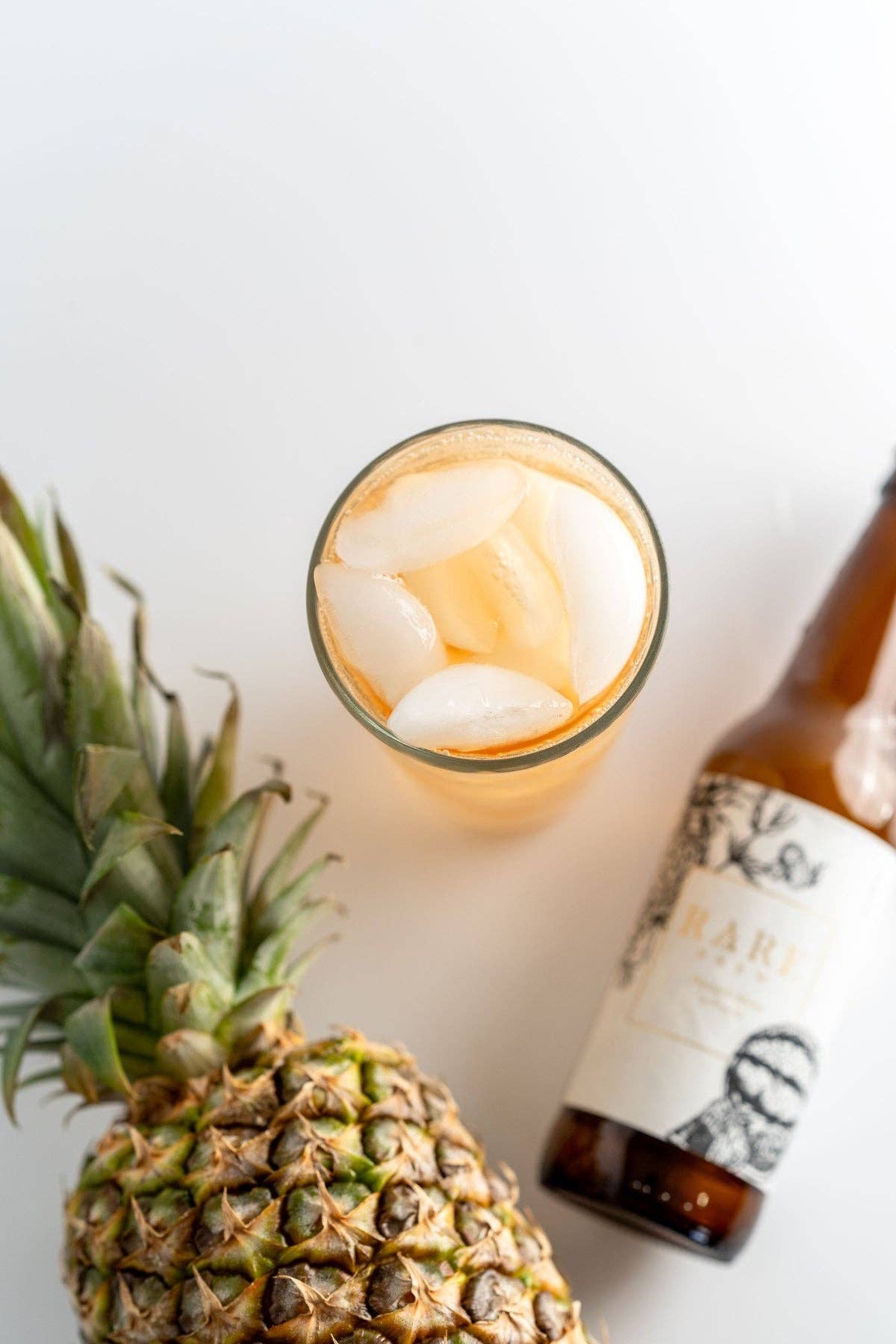 Rare Brew – Großhandel Alkoholfreier Aperitif/Mocktail – Ananas Melone - Sprudeltee - Großhandelsflasche2