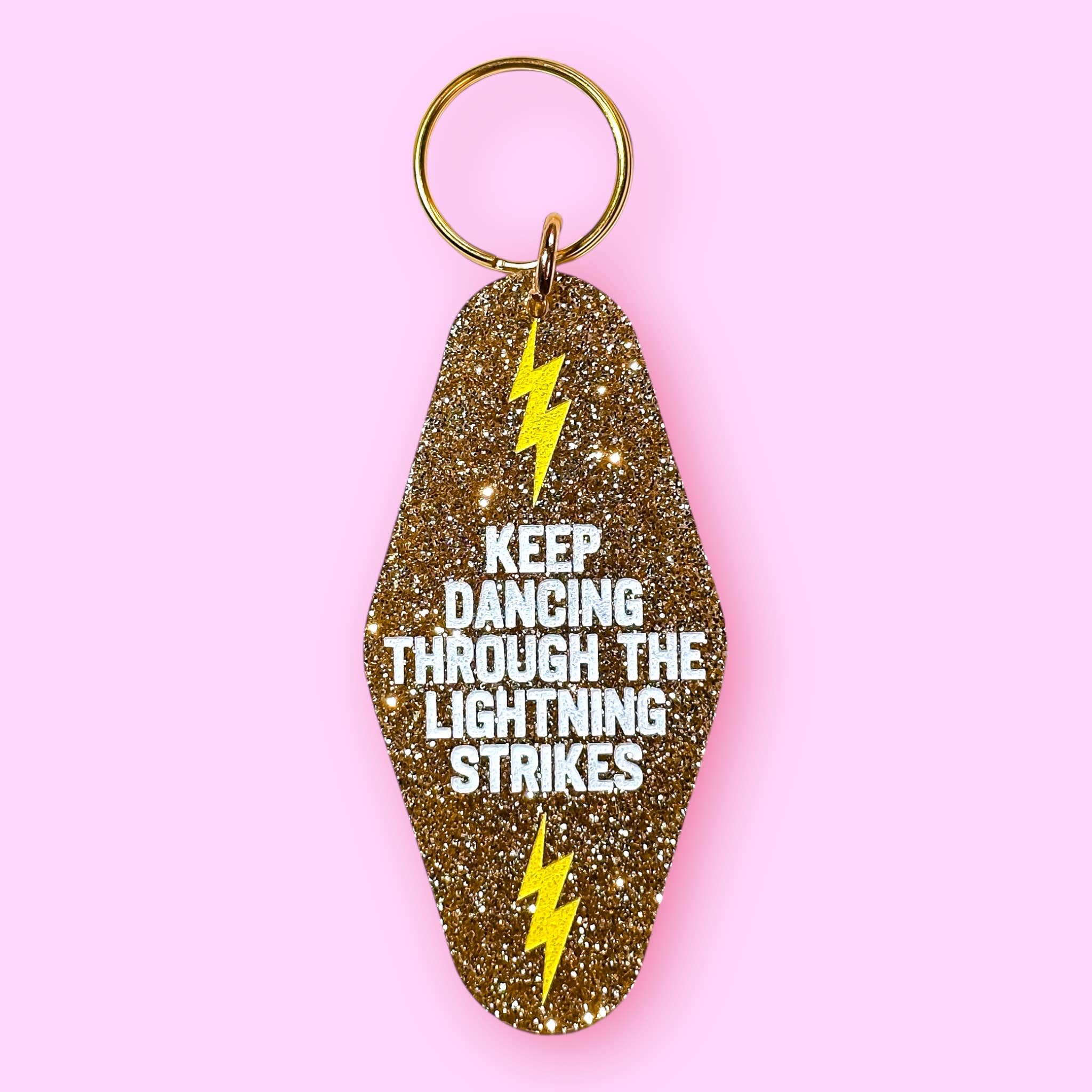 The Hissin' Kitten - Wholesale Keychain - Unisex - Keep Dancing Through The Lightning Strikes Keychain1