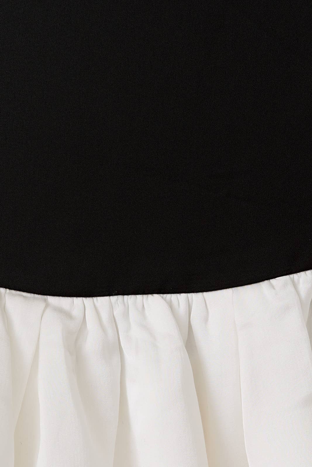 BLACK WHITE BOAT NECK SLEEVELESS BUBBLE HEM DETAIL MINI DRESS for wholesale on Faire10