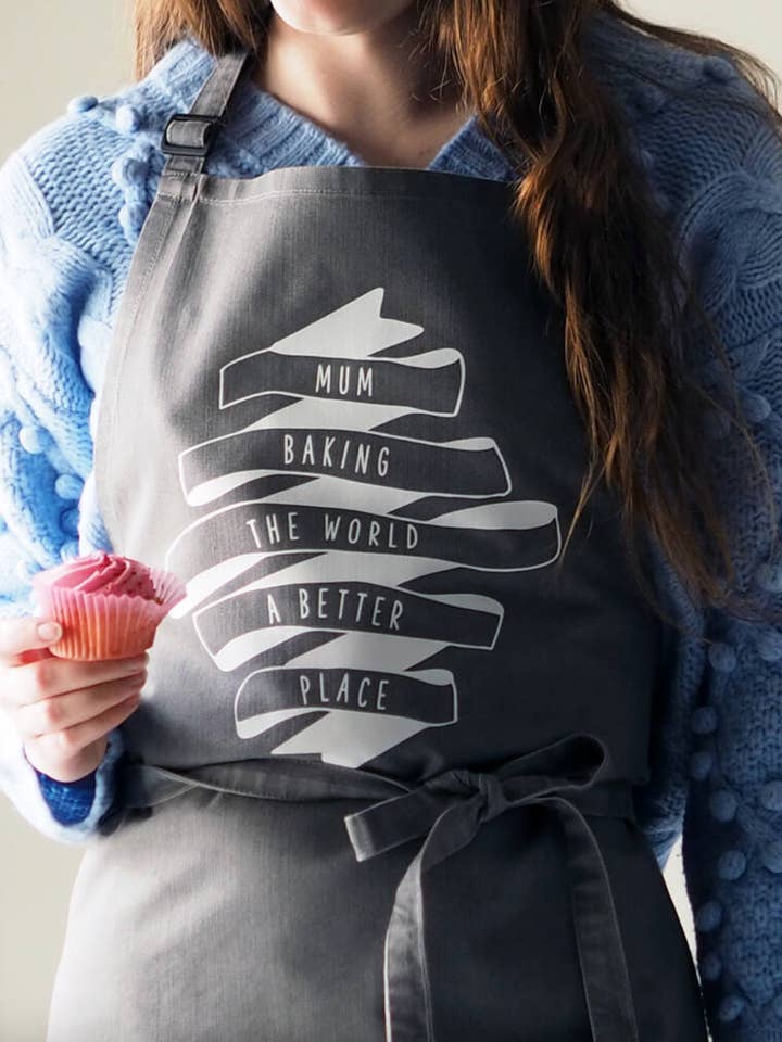 Personalised 'Baking The World A Better Place' Denim Apron for wholesale by CloudsandCurrents
