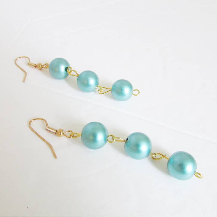 Orecchini in acrilico Teal Thing per la vendita all'ingrosso da parte di Satin Doll & Co.