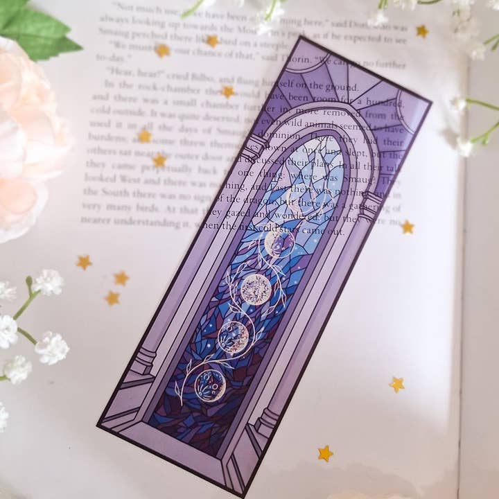 Romantasy Designs – wholesale Bookmark – Blue window and moon phase stained glass style transparent bookmark1
