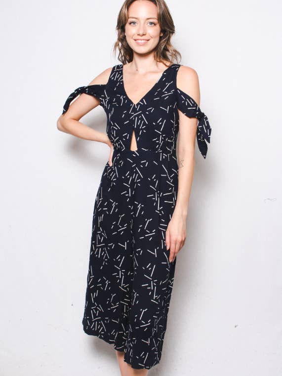 Women's Line Print V Neck Jumpsuit with Cut Outs for wholesale by Good Stuff Apparel