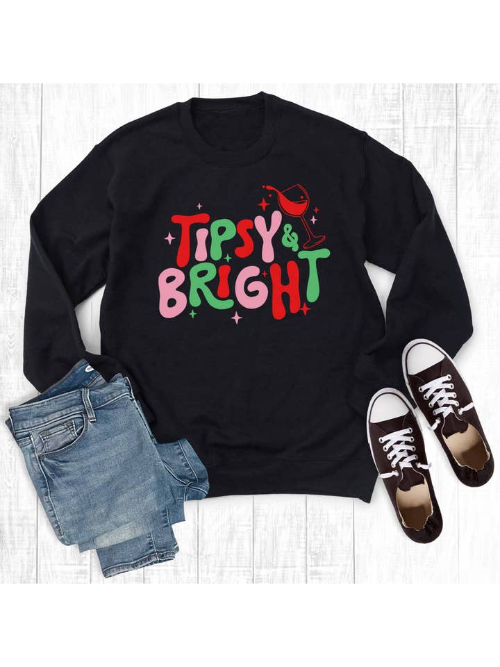 Black Funny Christmas Tipsy and Bright Graphic Sweatshirt for wholesale on Faire