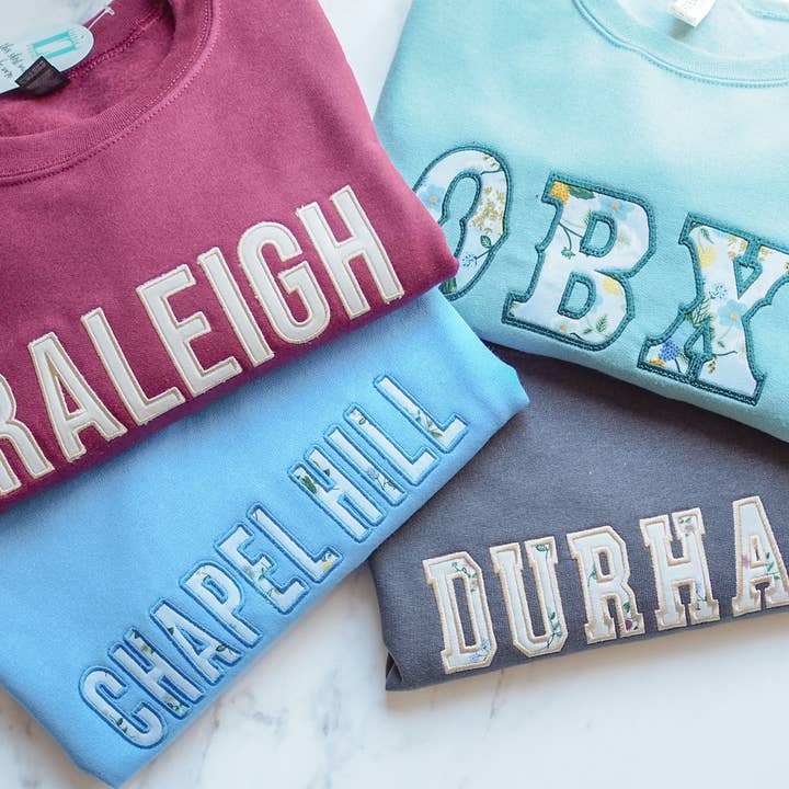 Appliqué NC City & OBX Sweatshirts for wholesale by Little L Designs