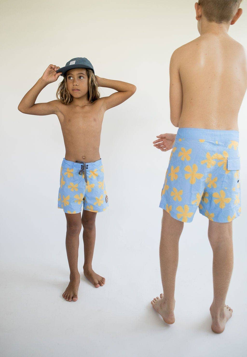 Kid’s Townshort Boardshorts in Light Blue Plumeria for wholesale on Faire11