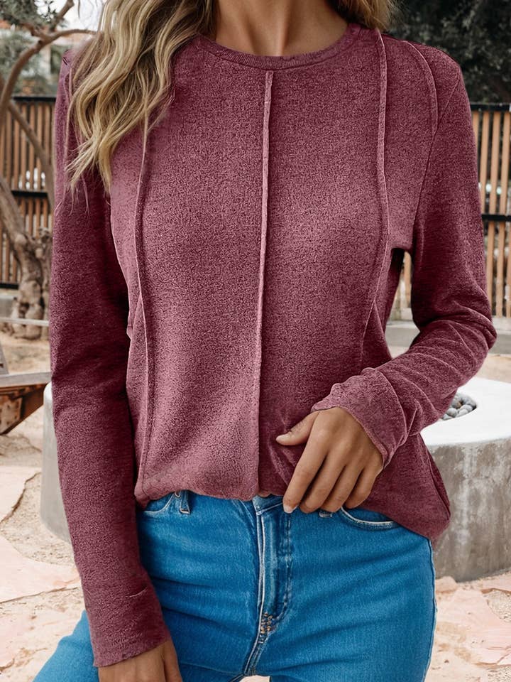 Haut à manches longues avec encolure ras-du-cou et couture apparente (S-2XL) pour la vente par 66DISCO