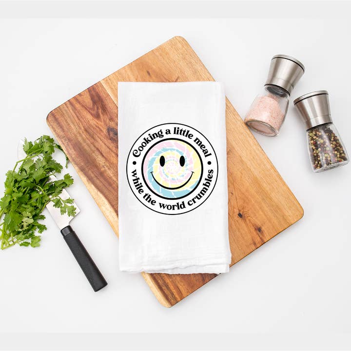 Cooking A Meal While The World Crumbles Kitchen Tea Towel for wholesale by Calm Down Caren