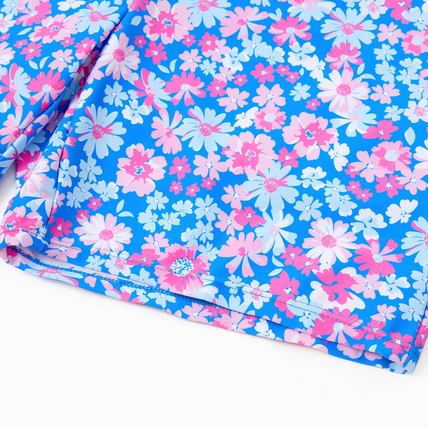 Blue Couple Matching Flora Swim Trunks or One-piece Swimsuit for wholesale on Faire7