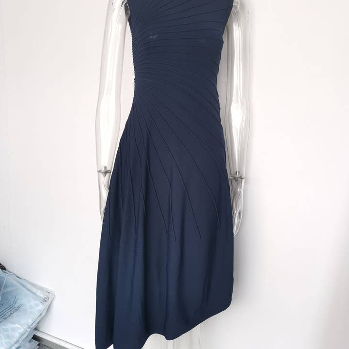 Productseeker - Wholesale Dress - Women's - DR867 Sleeveless Knit Vest Pleated Slim Fit Midi Dress4