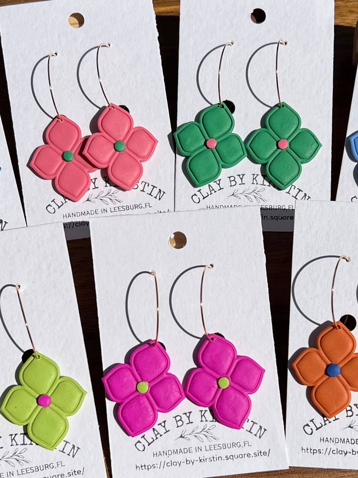 Quatro foil Clay Earring on 25mm gold colored hoops for wholesale by Clay by Kirstin