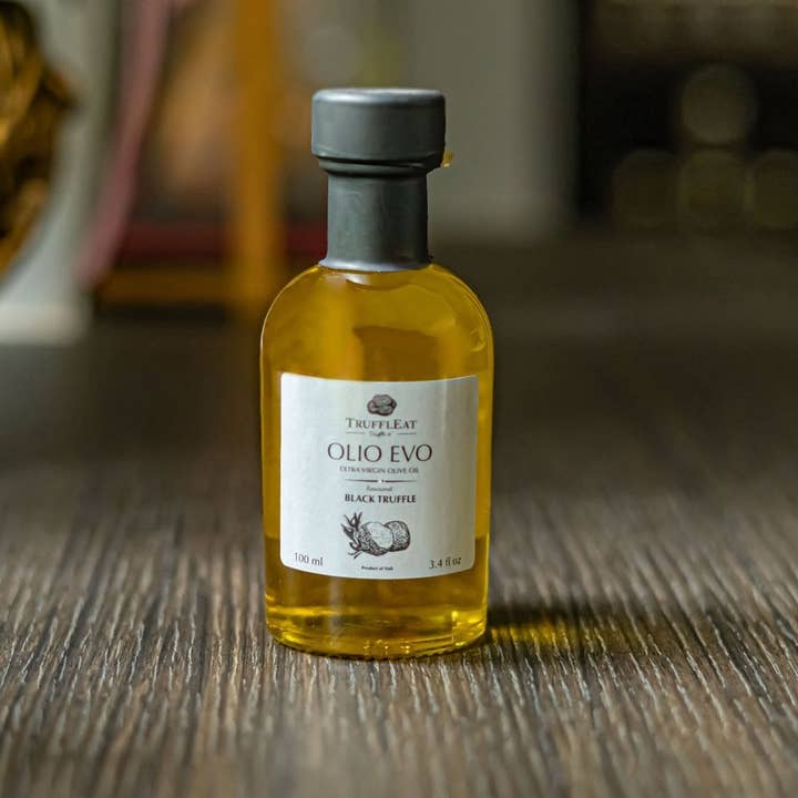 Huile d'olive extra vierge aromatisée à la truffe noire pour la vente par Truffleat srl