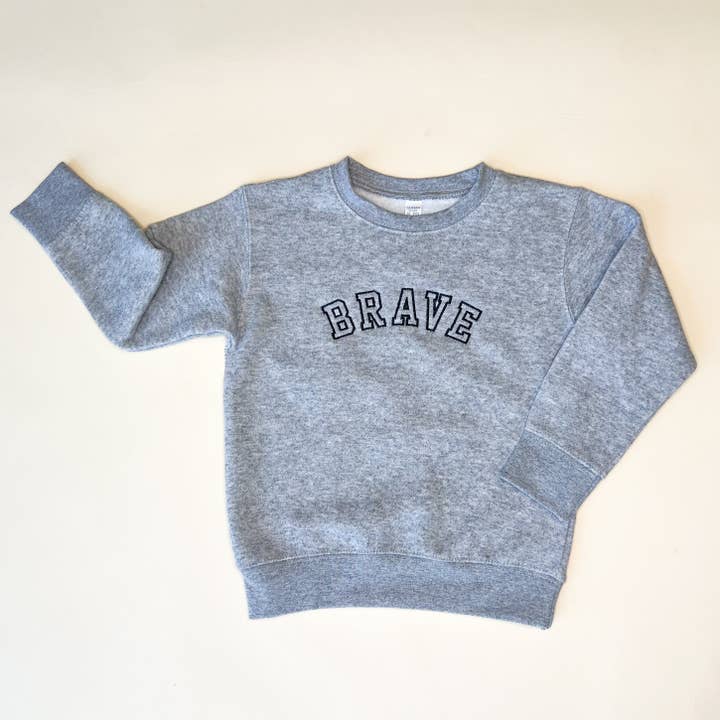 Sudadera Infantil Bordada Brave Varsity para venta al por mayor de Merce and Company