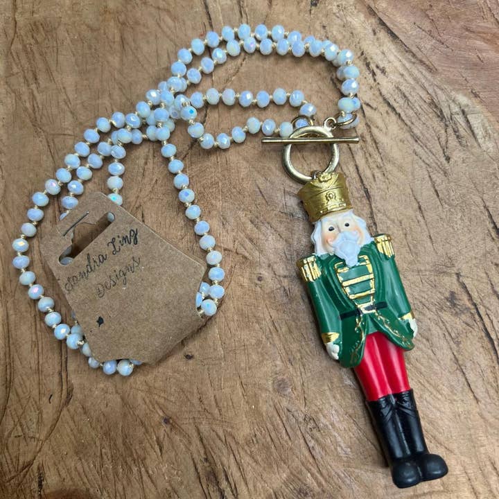 Sandra Ling Designs - Wholesale Pendant/Charm Necklace - 🪵 Nutcracker Charm Necklace – “Crack a Smile"0