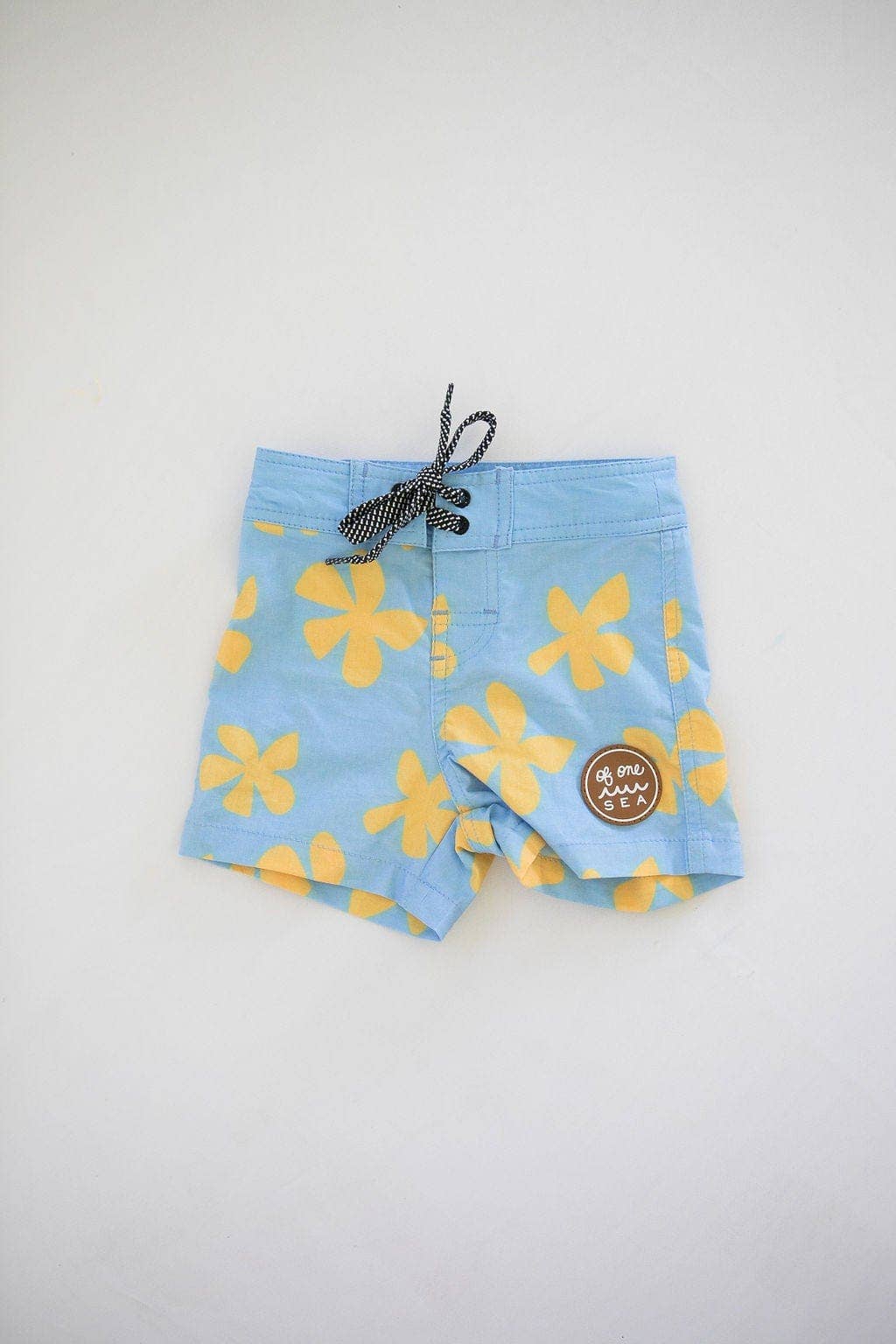 Kid’s Townshort Boardshorts in Light Blue Plumeria for wholesale on Faire7