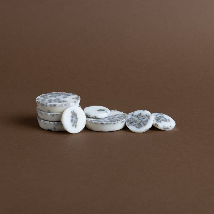 ROTONDI DI CERA PROFUMATI ALLA LAVANDA per la vendita all'ingrosso da parte di the MUNIO