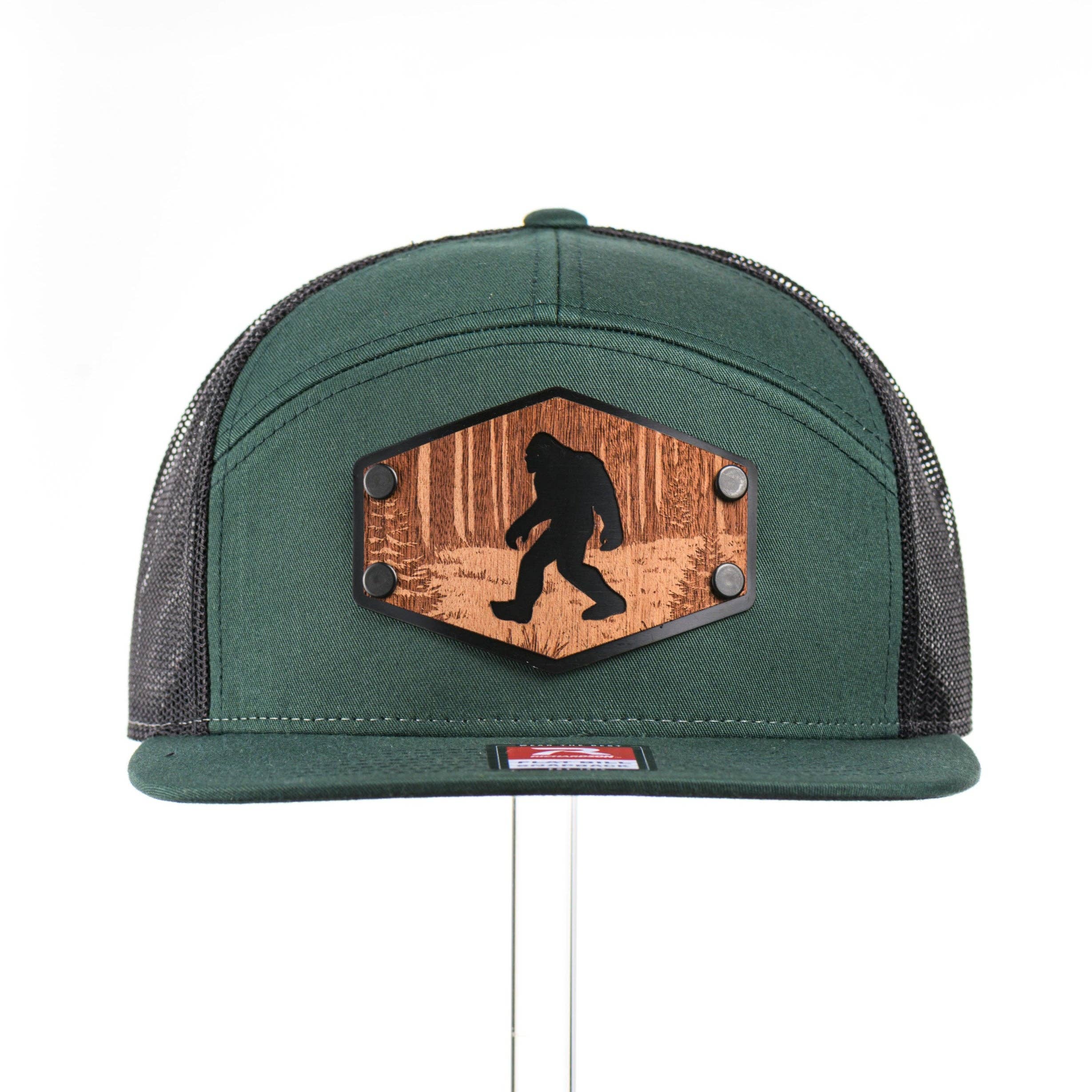 Mahogany Wood Roaming Bigfoot Patch Flat Bill Trucker Hat for wholesale by Last Best Supply Co