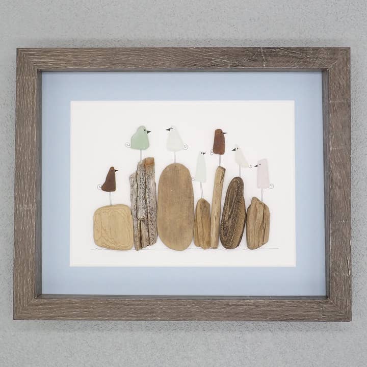 Flerfarvede havglasfugle på drivtømmer for engroshandel hos Driftsea Creations