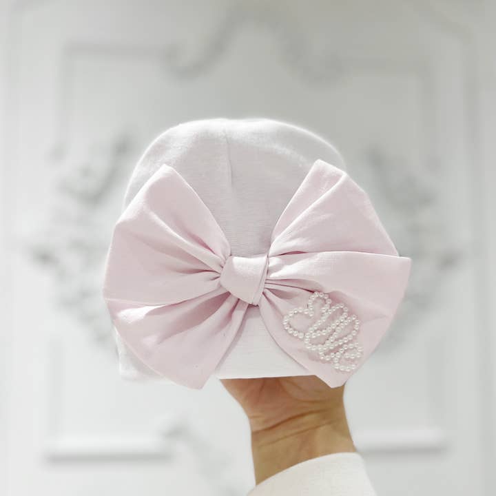Newborn Hat With Bow and other Purchase Wholesale personalized gloves. Free Returns & Net 60 Terms on Faire trending on Faire.