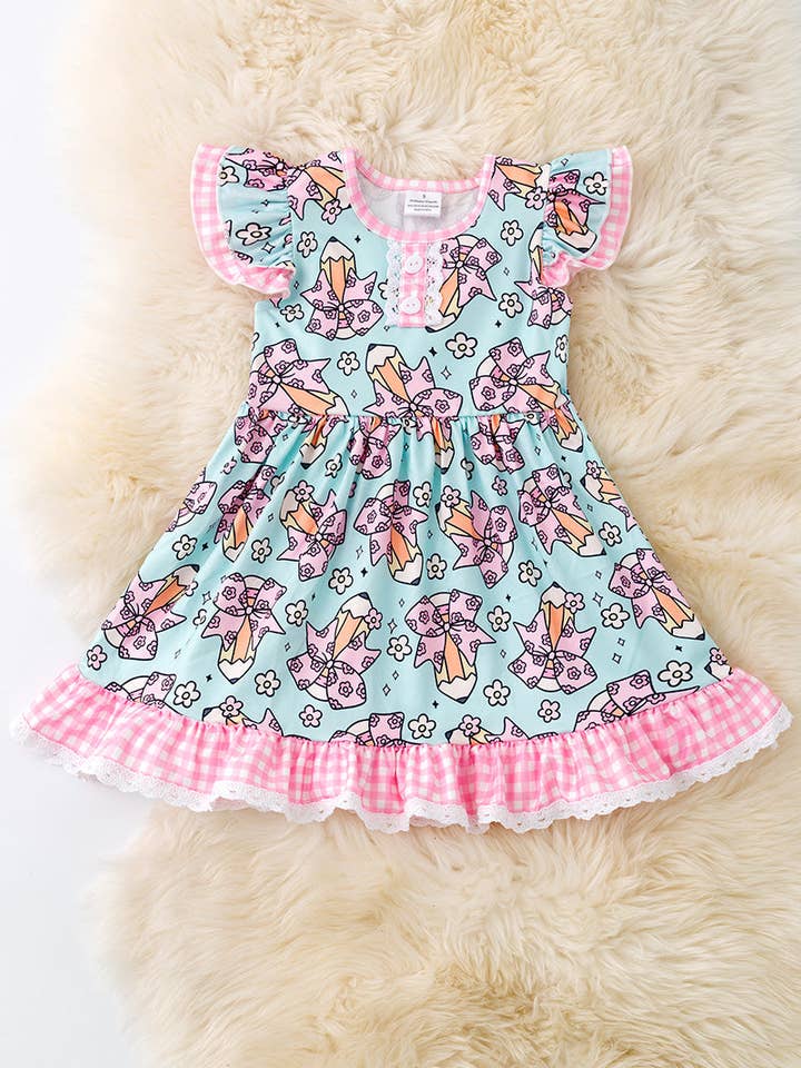 Coquette pencil printed on aqua color dress with gingham ruffle trim DRG51157 for wholesale by Kids Charm Online