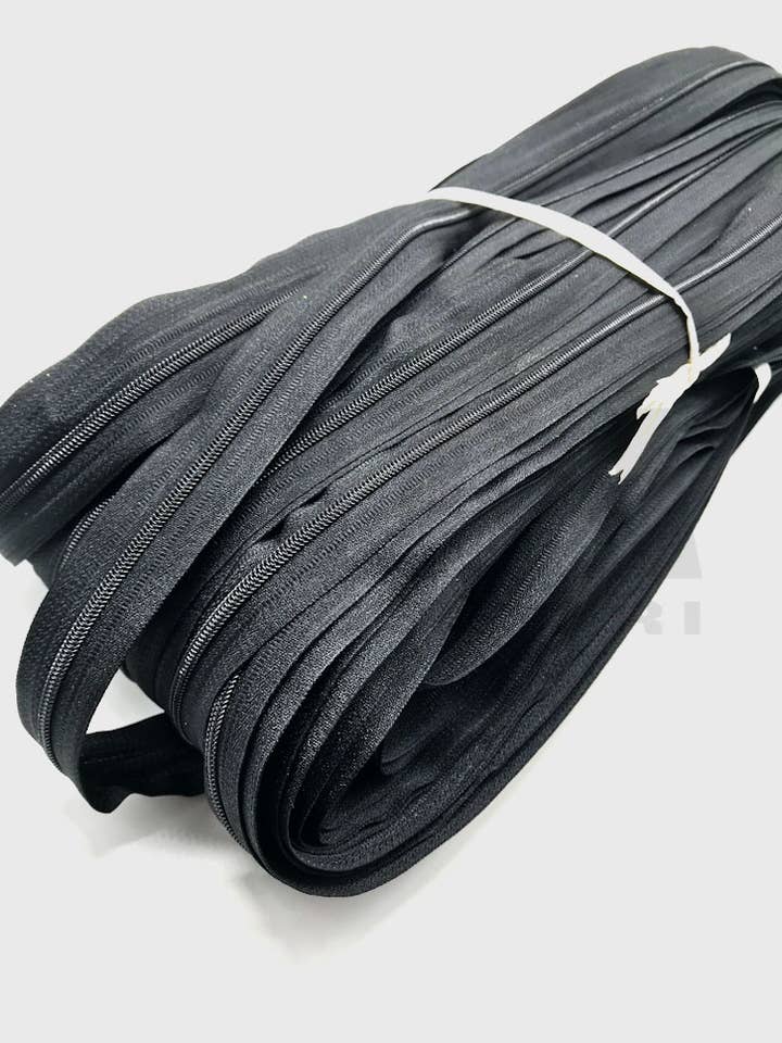 Spirallynlås type 3 i nylon pr. meter for engroshandel hos Gifa Accessori